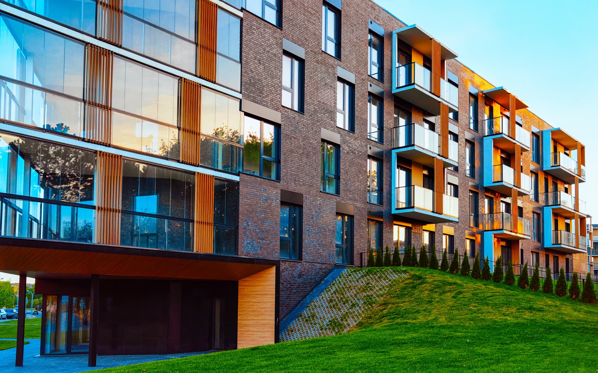 Modern brick and glass residential building at Rivulet in Dallas